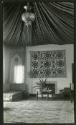 A suzani is featured above the fireplace in the Playhouse Living Room at Shangri La, March-Apri…